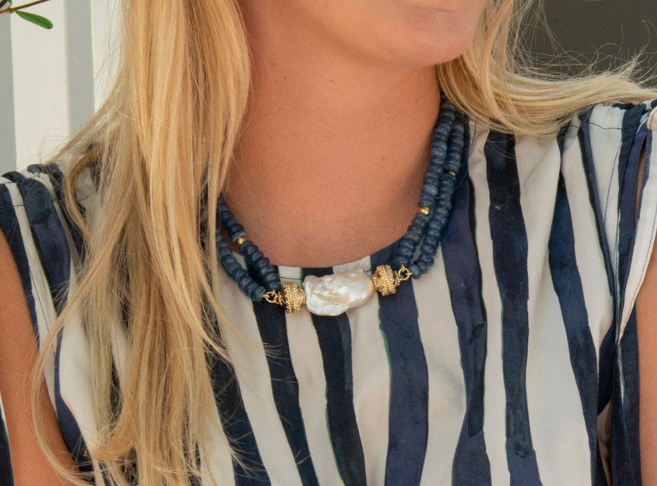 Clara Williams tassel, pearl centerpiece, multi strand necklace