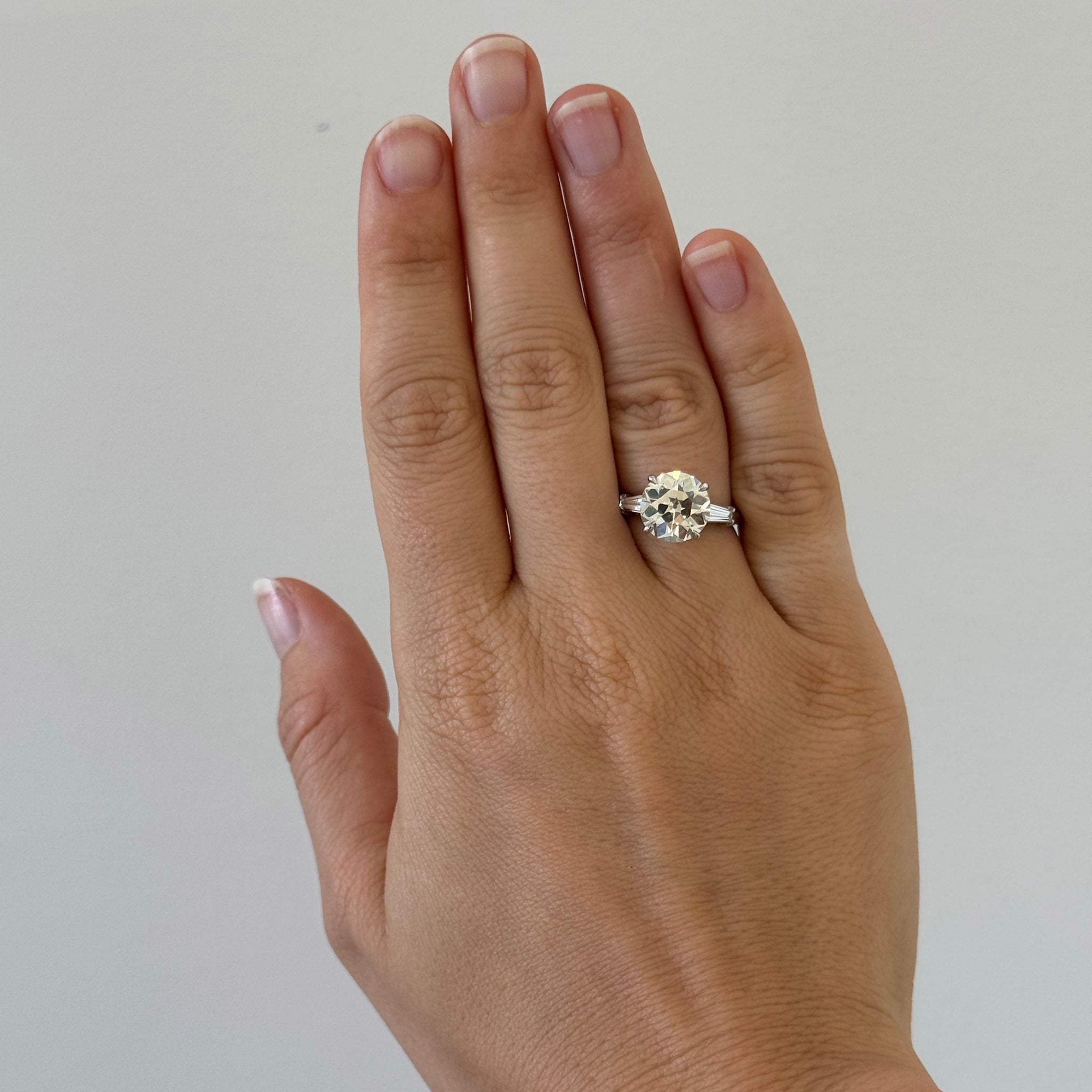 4.22ct Center & .40ctw Side Diamond Three-Stone Platinum Ring