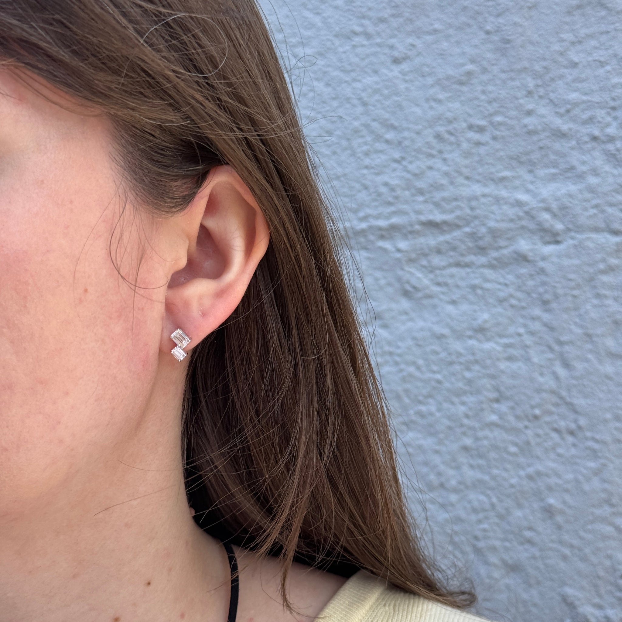 1.43ctw Emerald-Cut Double Diamond Stud Earrings Lifestyle