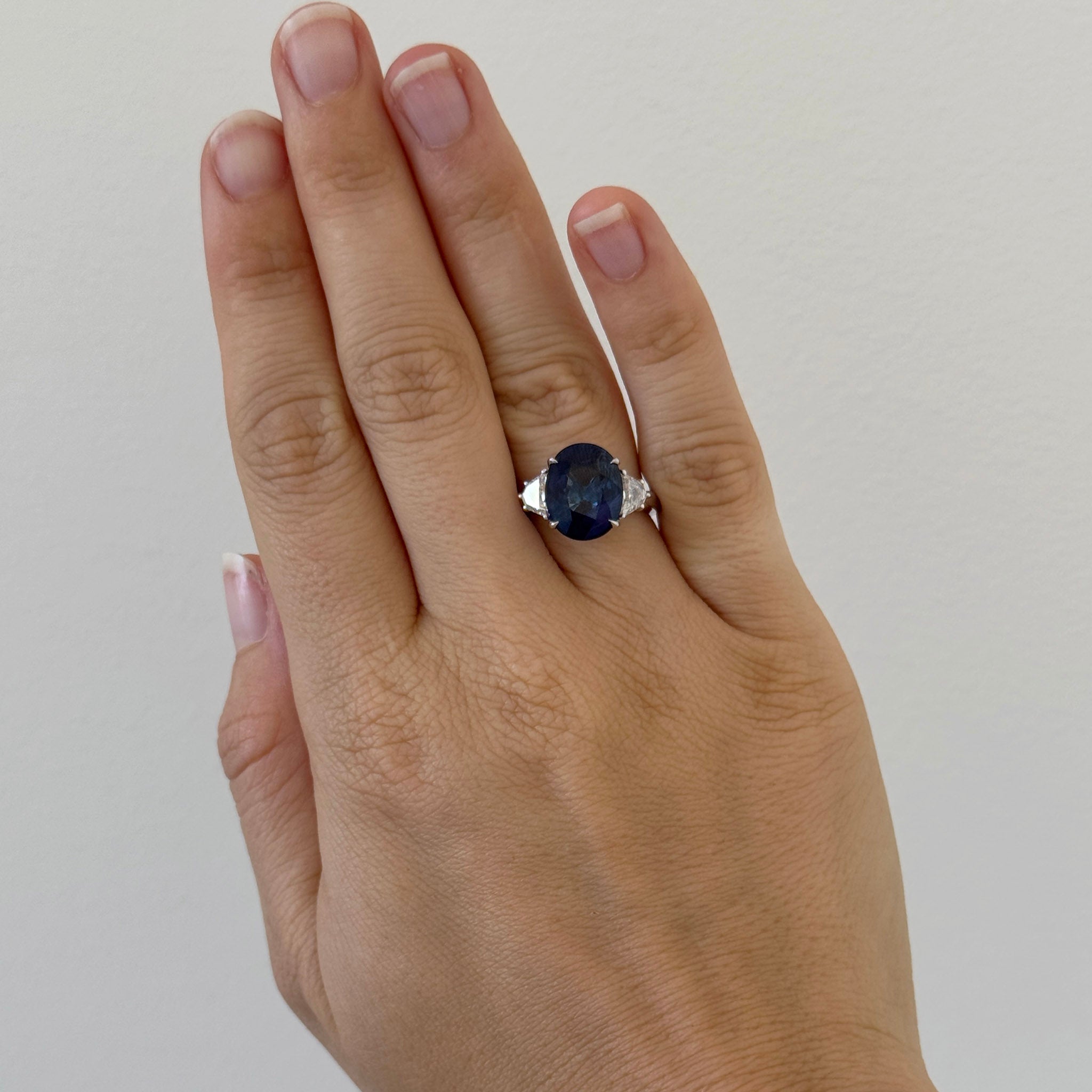 7ct Oval Sapphire & Epaulette Diamond Three-Stone Platinum Ring