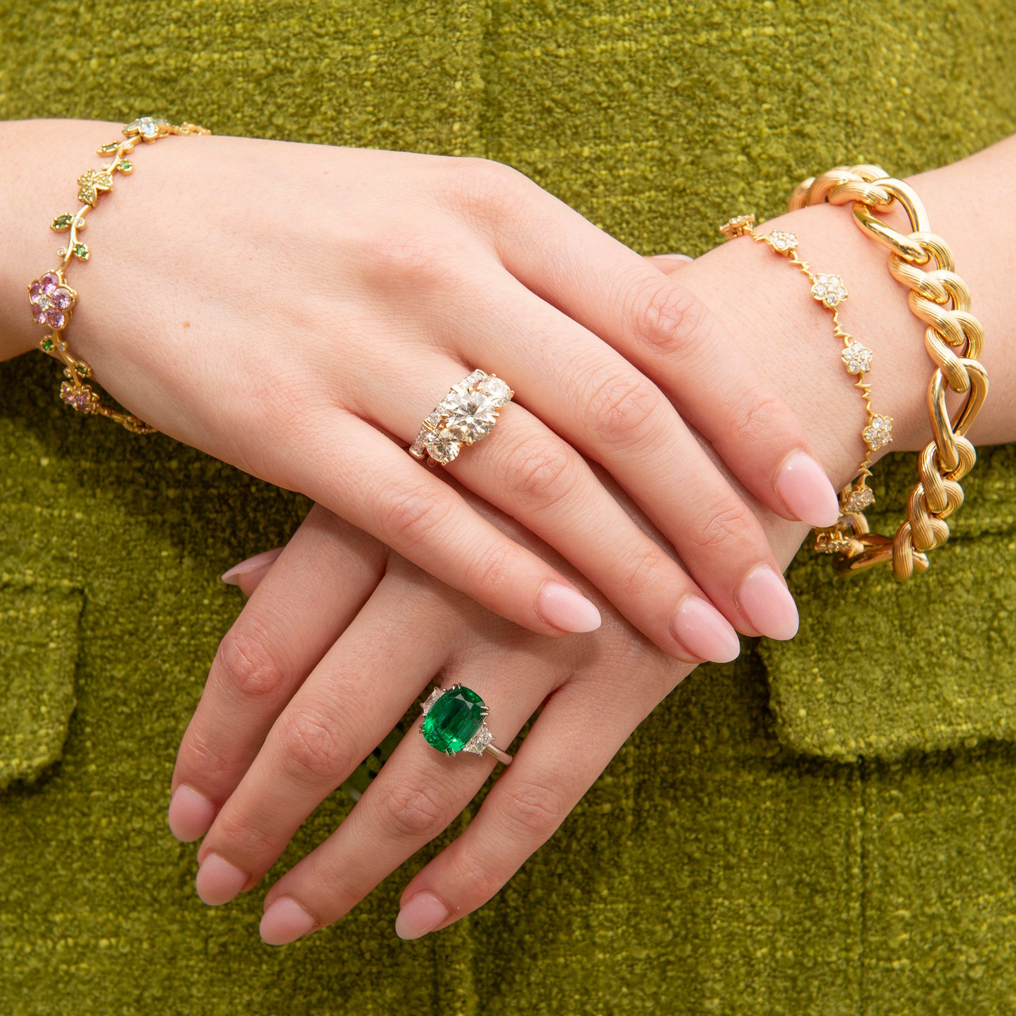 5ct Cushion Emerald & Trapezoid Diamond Three-Stone Platinum Ring, Round Brilliant Diamond Three-Stone 14K Gold Ring, Diamond 14K Gold Two-Tone Band, Paul Morelli Wild Child Link Bracelet, The Mini Mariana Bracelet