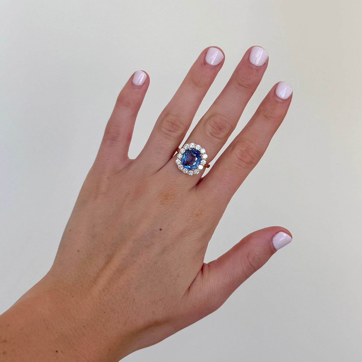 5.6ct Cushion Sapphire & Diamond Halo 18K Yellow Gold Ring