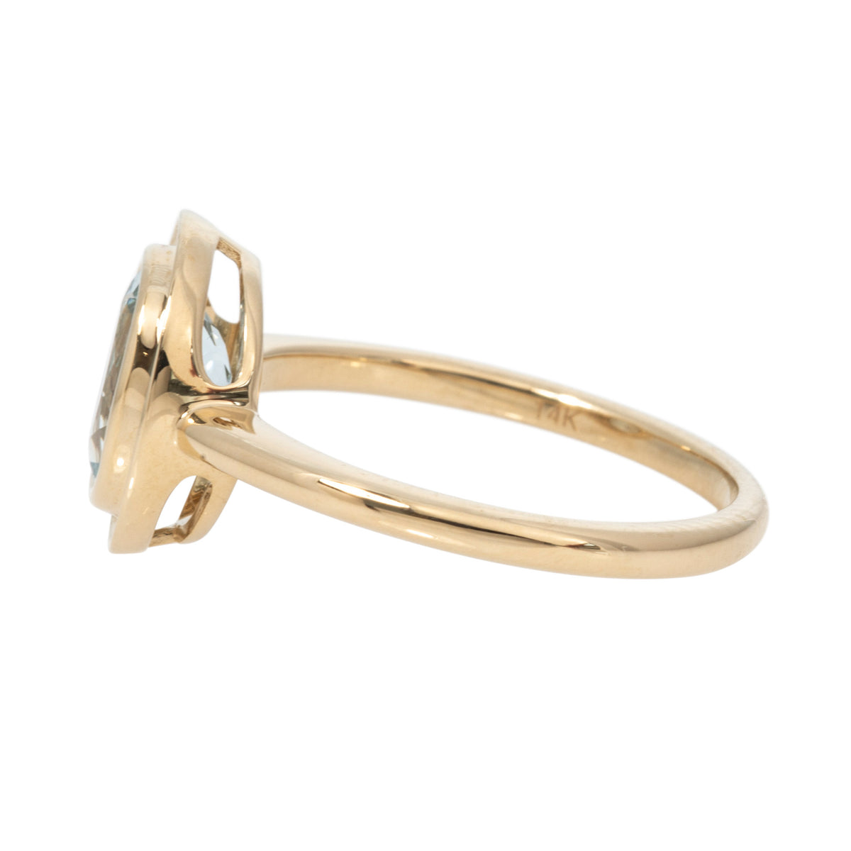 Side view of Aquamarine 14K Yellow Gold Double Bezel Ring on a white background.