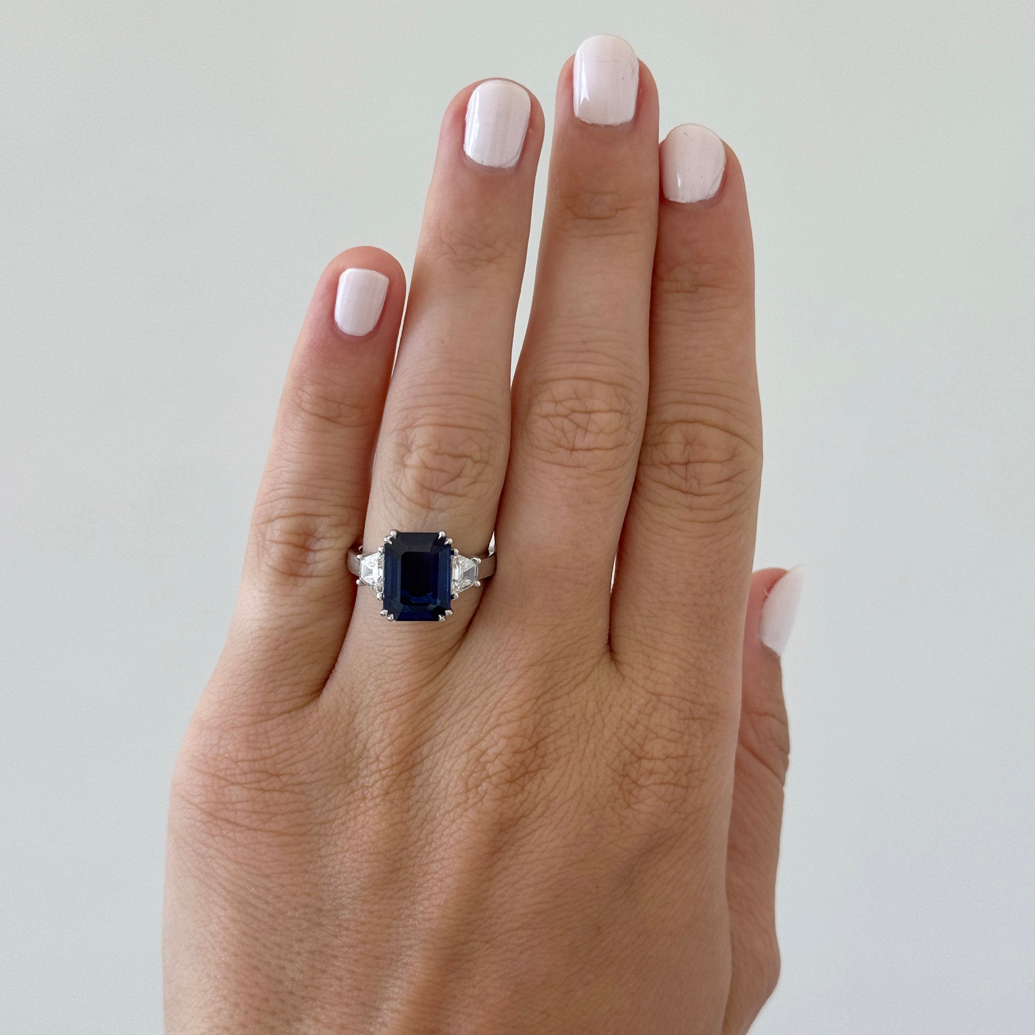 5ct Emerald-Cut Sapphire & Diamond Three-Stone Platinum Ring