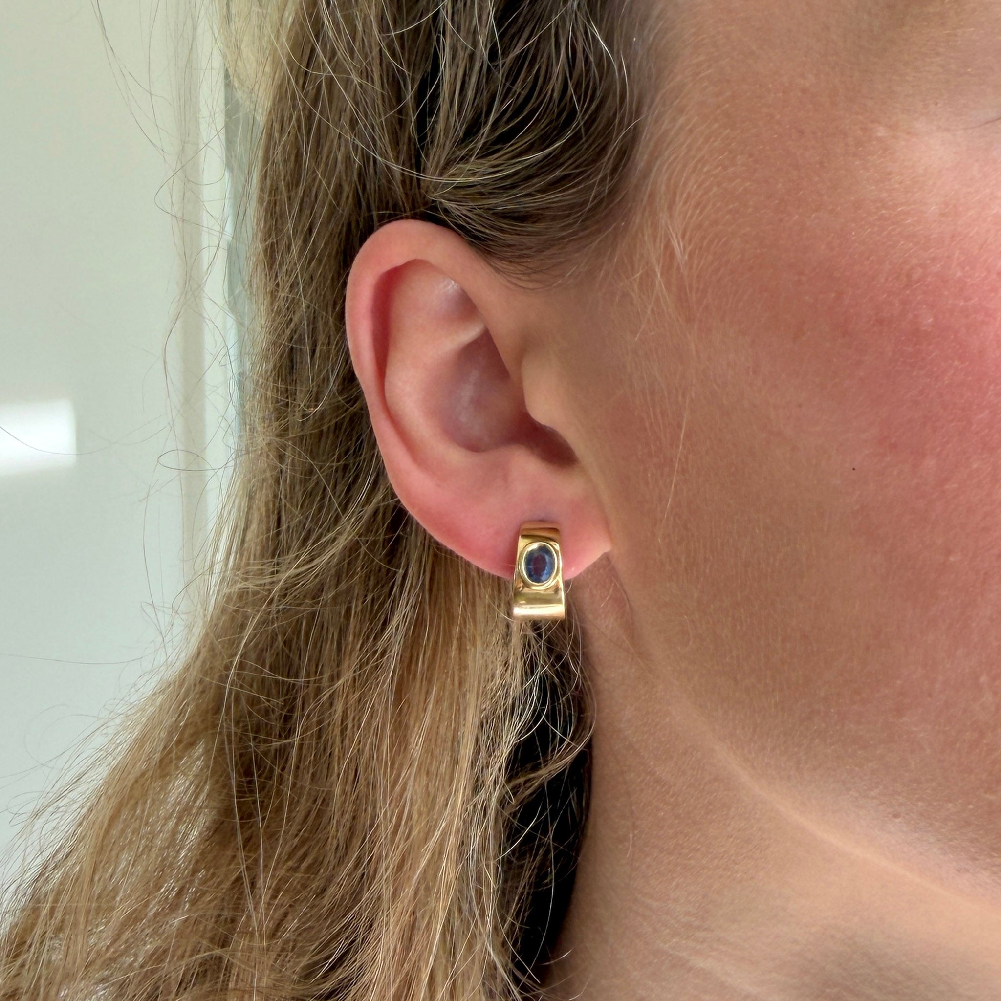 Oval Sapphire Bezel 18K Yellow Gold Huggie Earrings