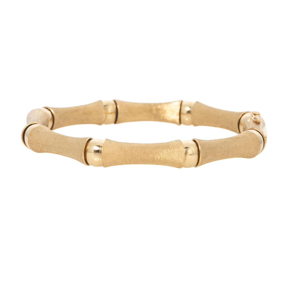 14K yellow gold bamboo link bracelet with satin-finish links and polished connectors, shown at an angle.