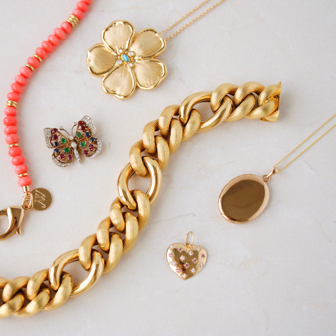 14K Yellow Gold Plain Oval Locket Necklace, Pink Sapphire & Diamond 14K Yellow Gold Heart Pendant, Vintage Diamond & Multi Stone 10K Gold Butterfly Brooch, The Mariana Bracelet