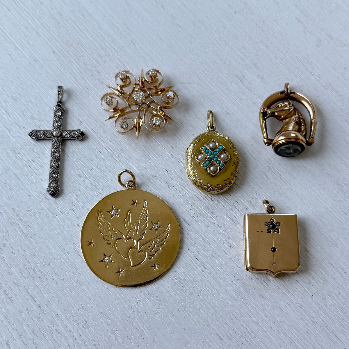 Art Deco Style Diamond & Sapphire Platinum Cross Pendant, Victorian Style Diamond 14K Gold Pinwheel Swirl Pin/Pendant, Victorian Sapphire & Pearl 9K Gold Shield Locket Pendant, Victorian Pearl & Turquoise 18K Gold Oval Locket Pendant, Estate Diamond 14K Gold Engraved Winged Hearts Disc Pendant