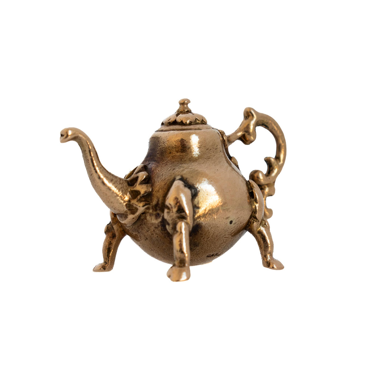 Vintage 9K yellow gold teapot charm with a curved spout, ornate scroll handle, decorative lid, and raised feet.
