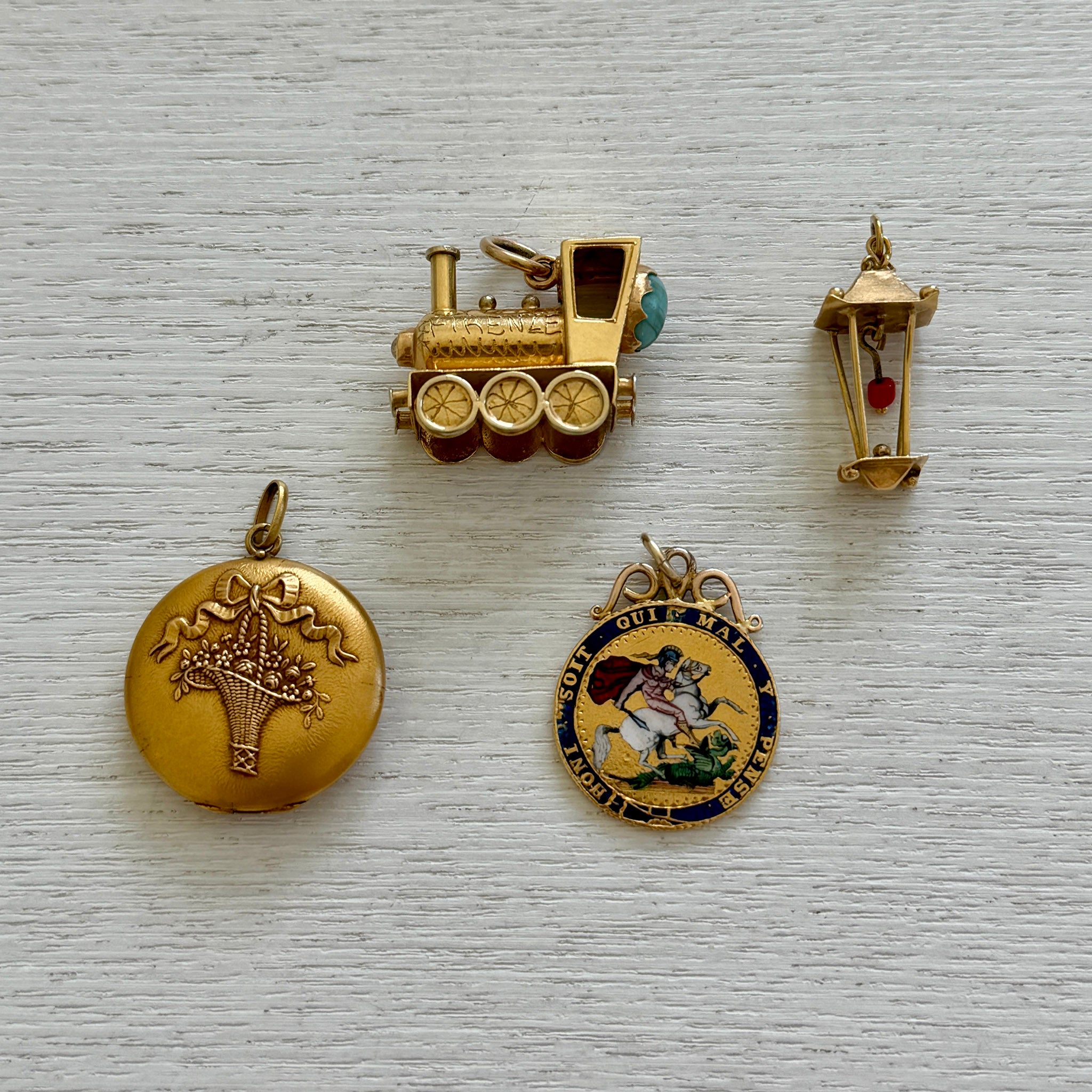 Victorian 18K Gold Flower Basket Repoussé Round Locket Pendant, Estate 1820 George III Sovereign 22K Gold Enamel Pendant, Vintage 18K Gold Red Stone Lantern Charm, Vintage 18K Gold Multi-Stone Italian Locomotive Charm