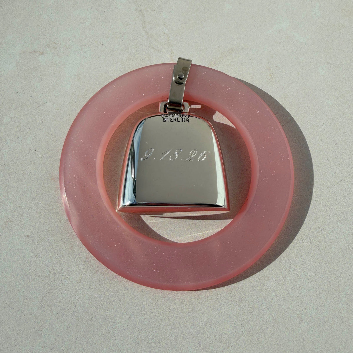 Pink Teething Ring Silver Baby Rattle with machine engraved date on the backside