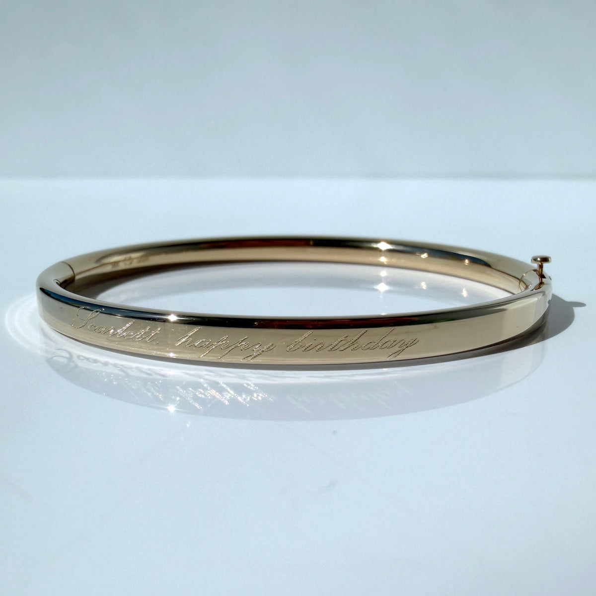 Child 14K Yellow Gold Plain Bangle with machine engraving