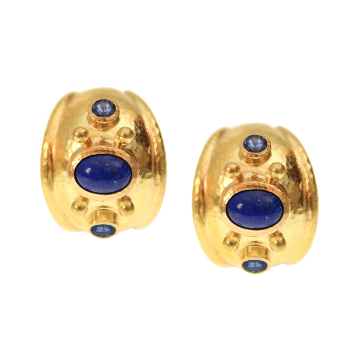 Elizabeth Locke small puff earrings in hammered 19K yellow gold with oval lapis centers, blue sapphire accents, and gold dots.