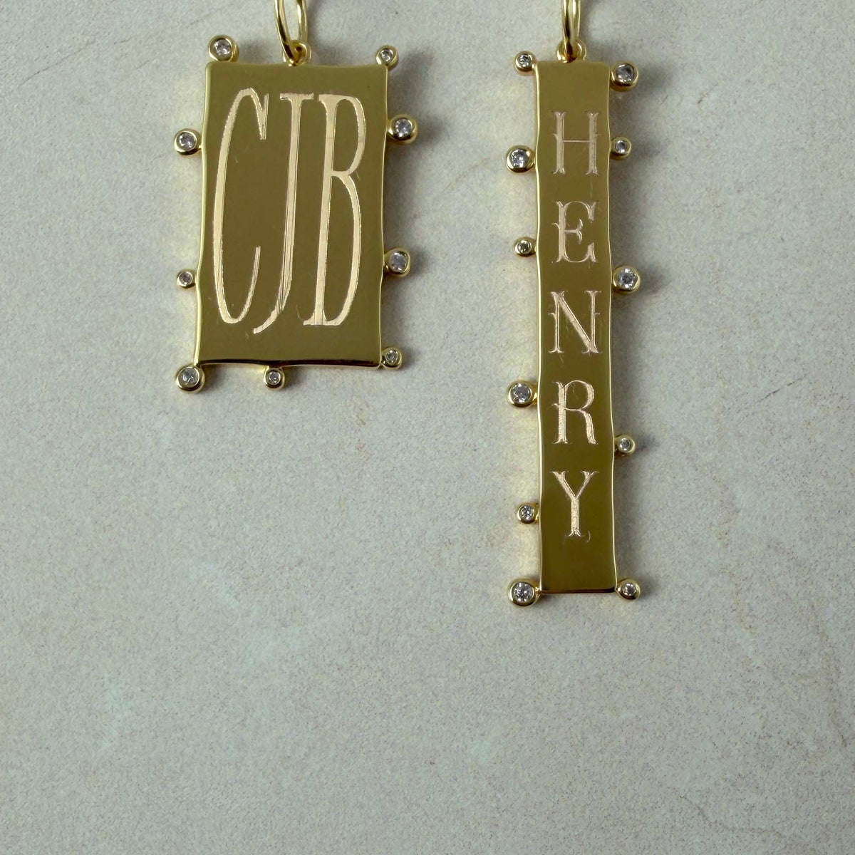 Goldbug Collection Sprinkle Tag Charms with machine engraving on the front