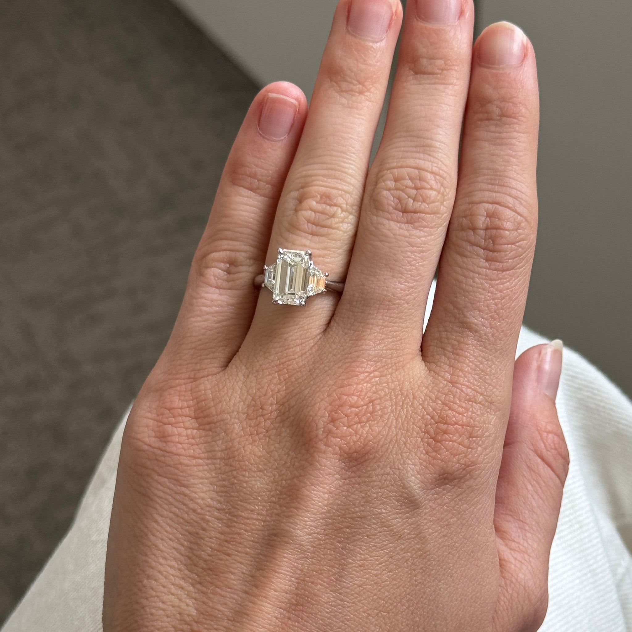 3ct Center Emerald-Cut & 1ctw Side Trapezoid Diamond Three-Stone Platinum Ring