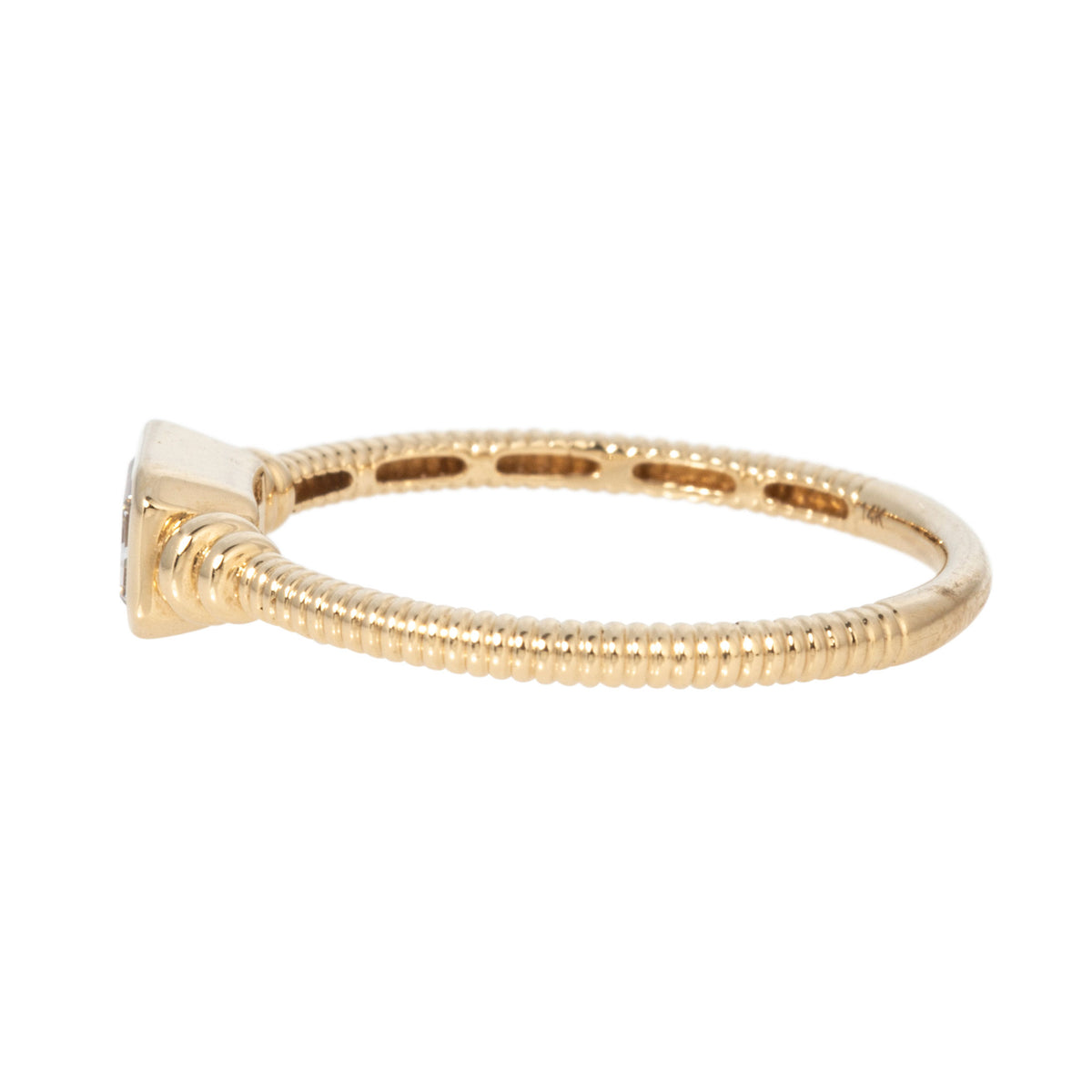 Side view of emerald-cut diamond solitaire ring showing the bezel setting and ribbed 14K yellow gold band.