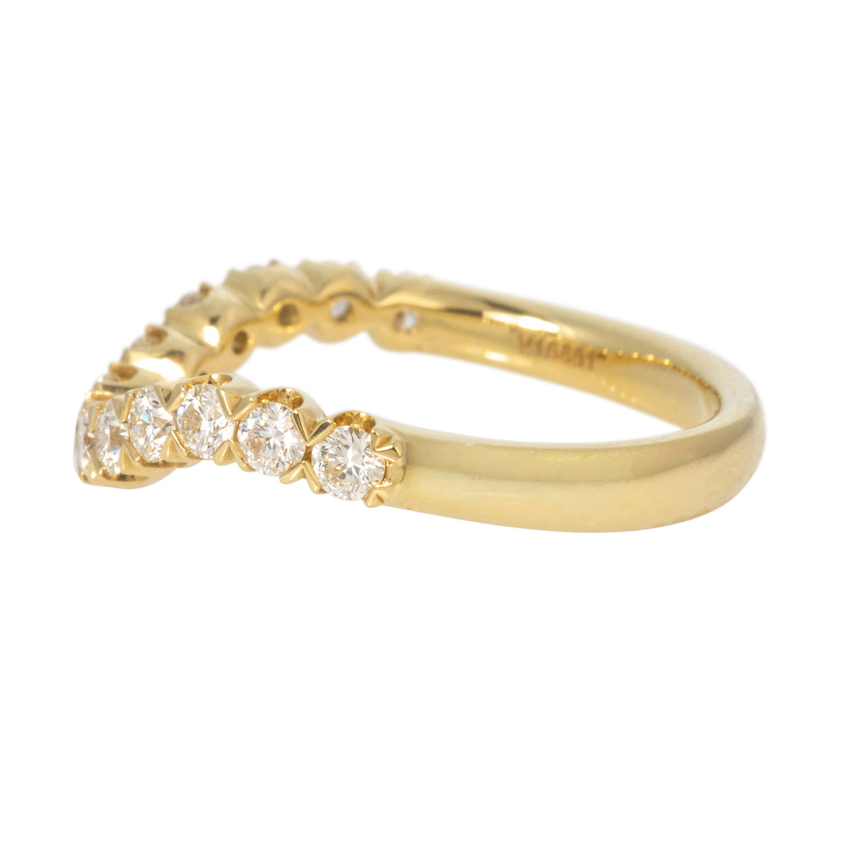 Side view of curved diamond half-band showing round diamond settings and a polished 18K yellow gold shank.