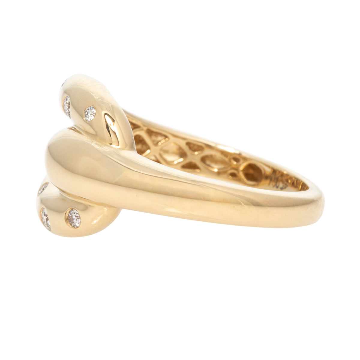 Side view of the diamond 18K yellow gold pouf buckle ring showing its rounded profile and tapered band.