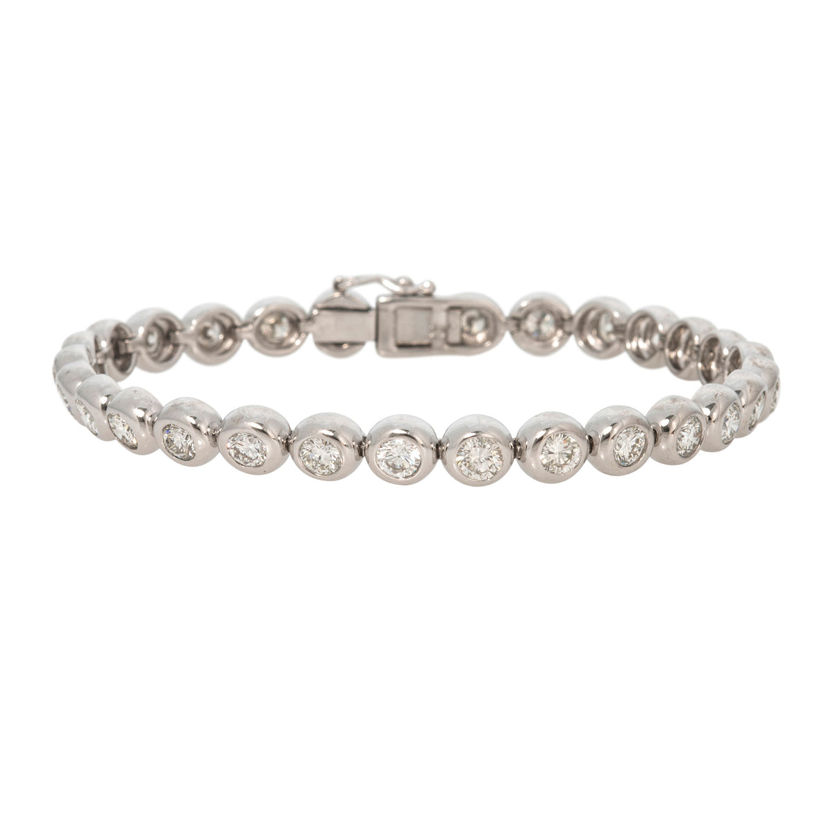 Estate 14K white gold tennis bracelet with round bezel-set diamonds, shown on a white background.
