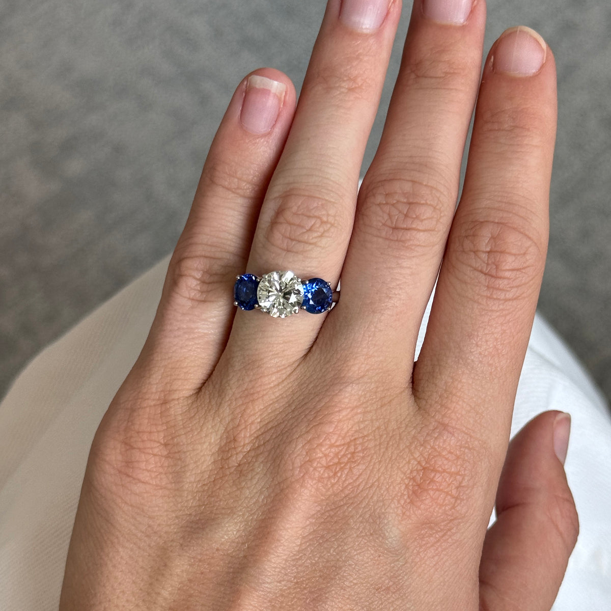 2ctw Round Diamond & 2.63ctw Sapphire Three-Stone Platinum Ring