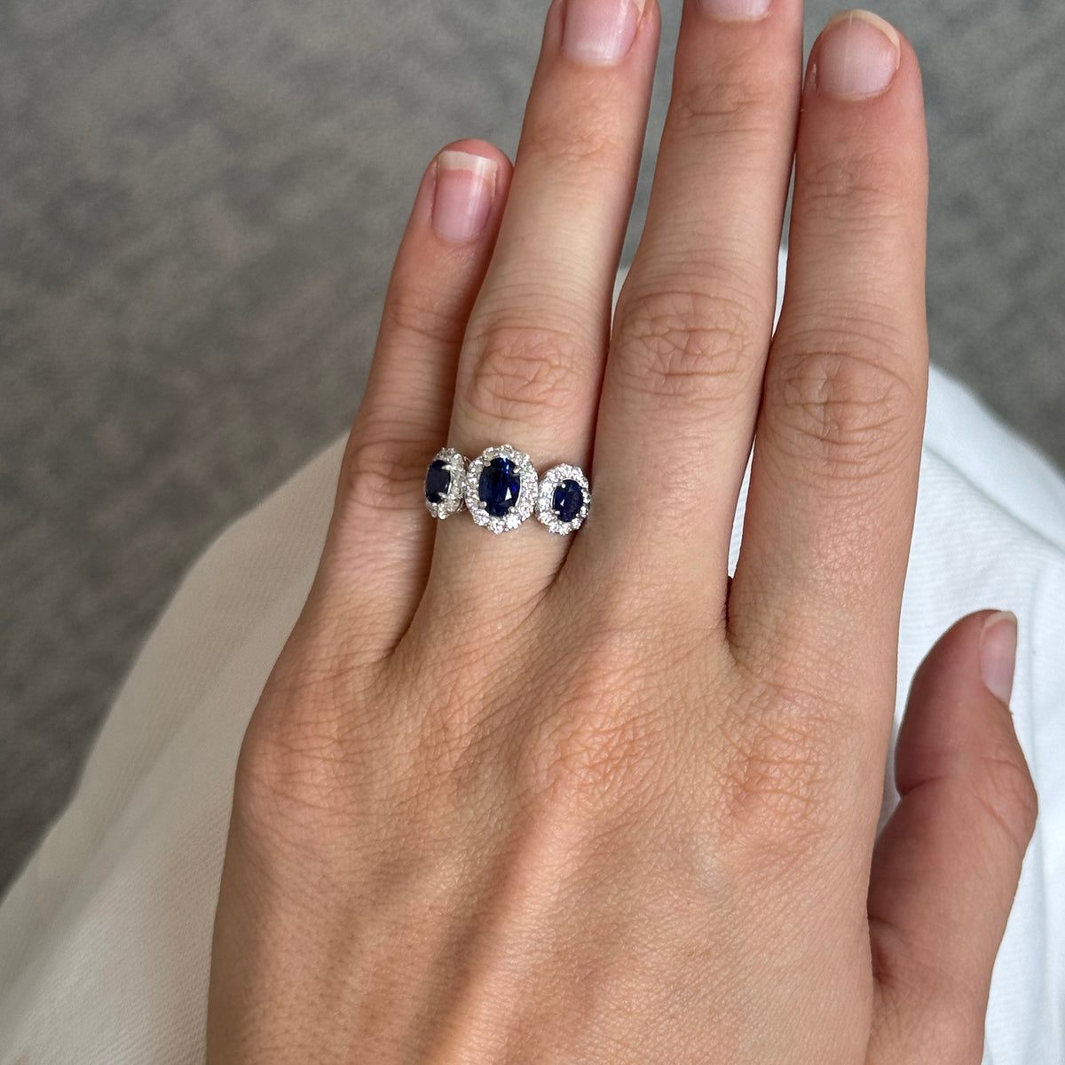Oval Sapphire Three-Stone & Diamond Halo 18K White Gold Ring