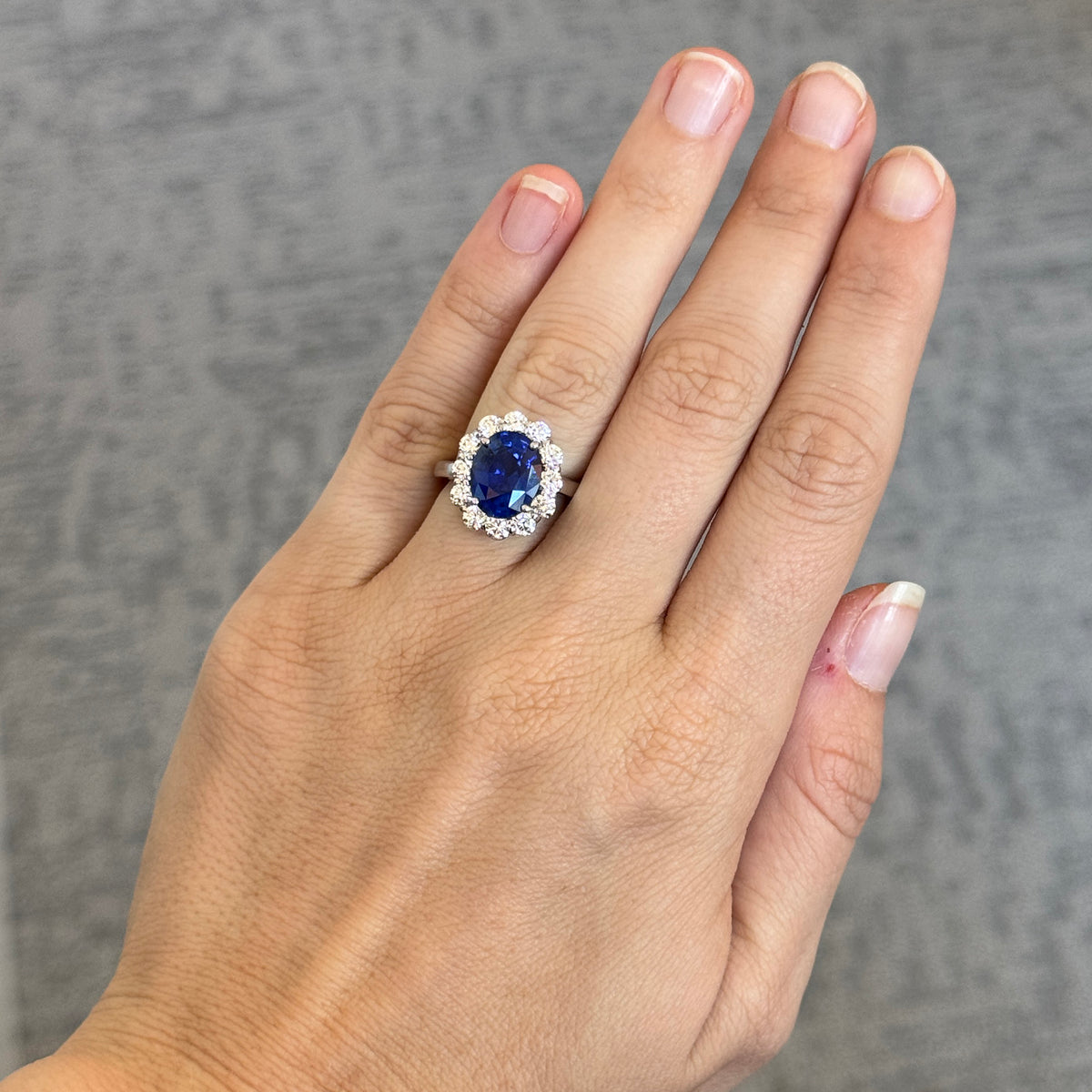 4.61ct Oval Sapphire & Diamond Halo Platinum Ring