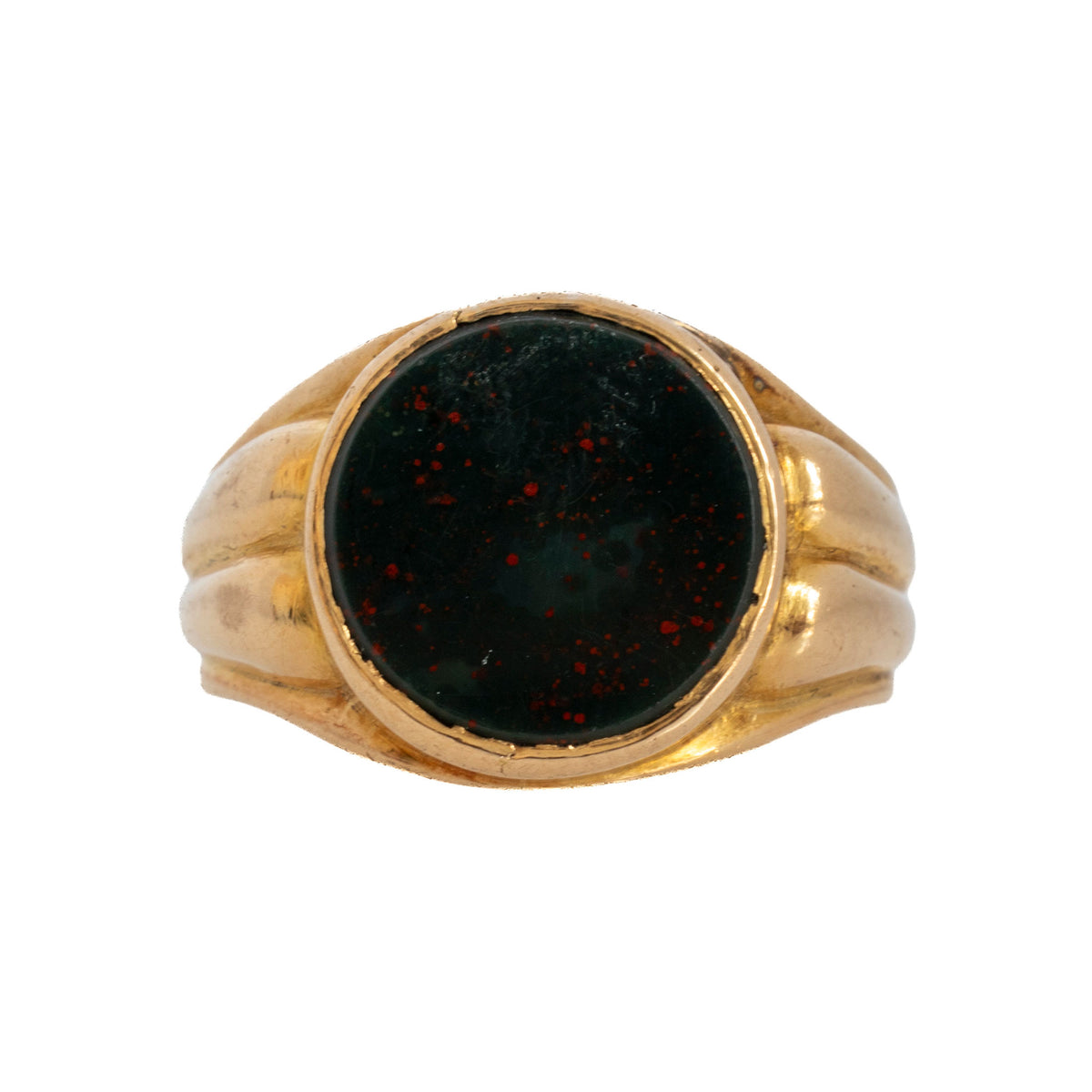Victorian 18K yellow gold signet ring with a round dark green bloodstone flecked with red and fluted shoulders.