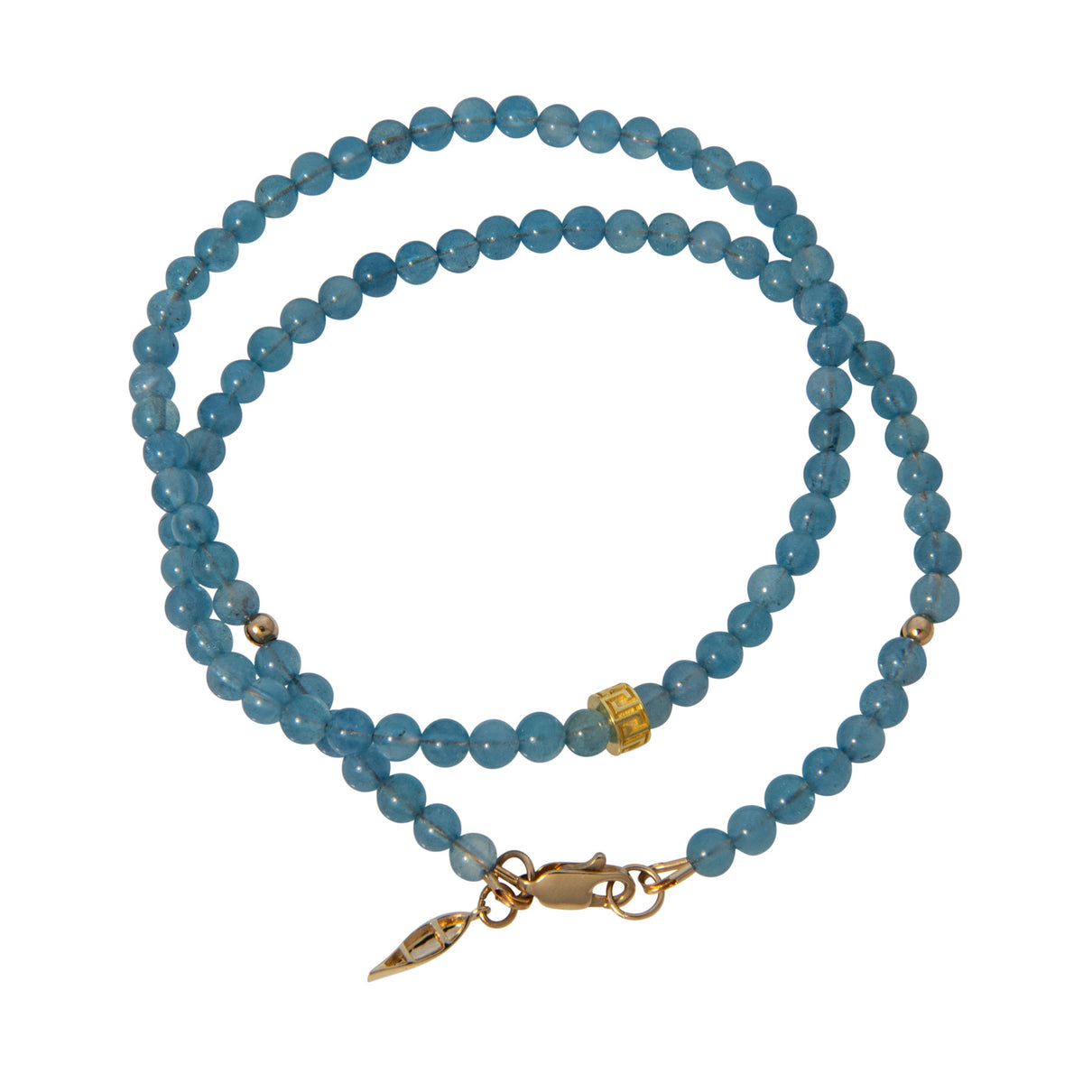 Tippy Stern aquamarine beaded necklace with a yellow gold Greek key rondelle, spacer beads, and canoe charm.
