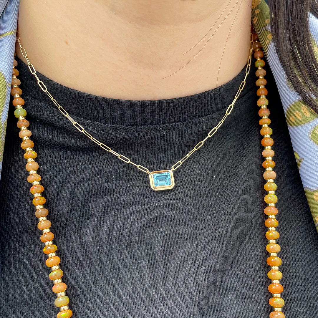 Goshwara Emerald Cut Blue Topaz 18K Gold Pendant Necklace