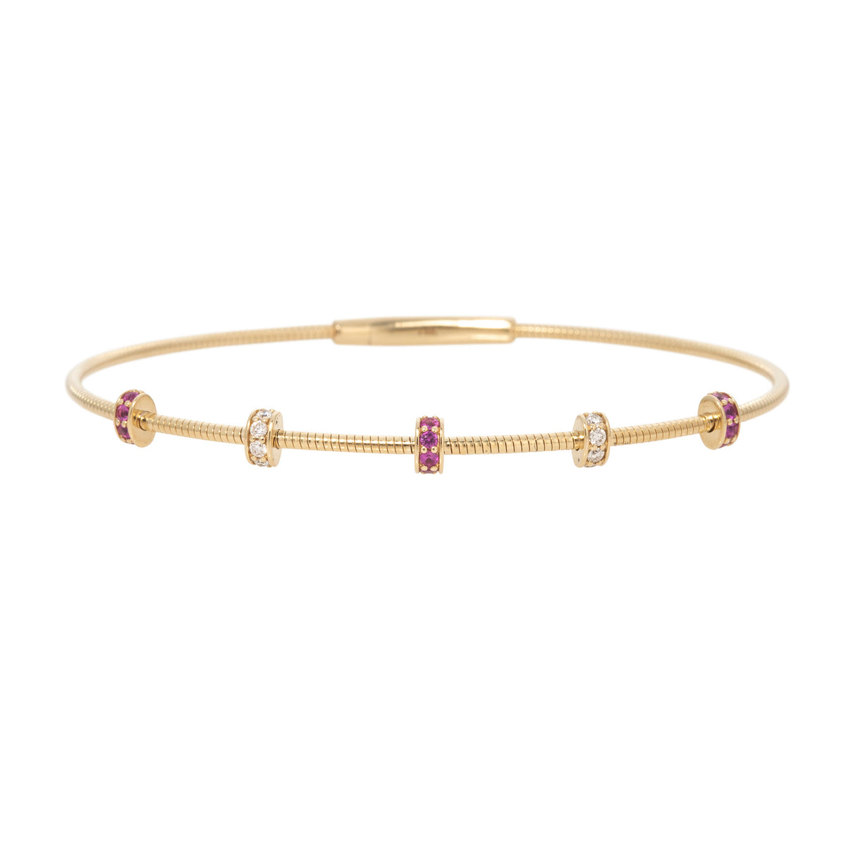 14K yellow gold flexible bangle with five alternating pink sapphire and diamond rondelle stations, shown on a white background.