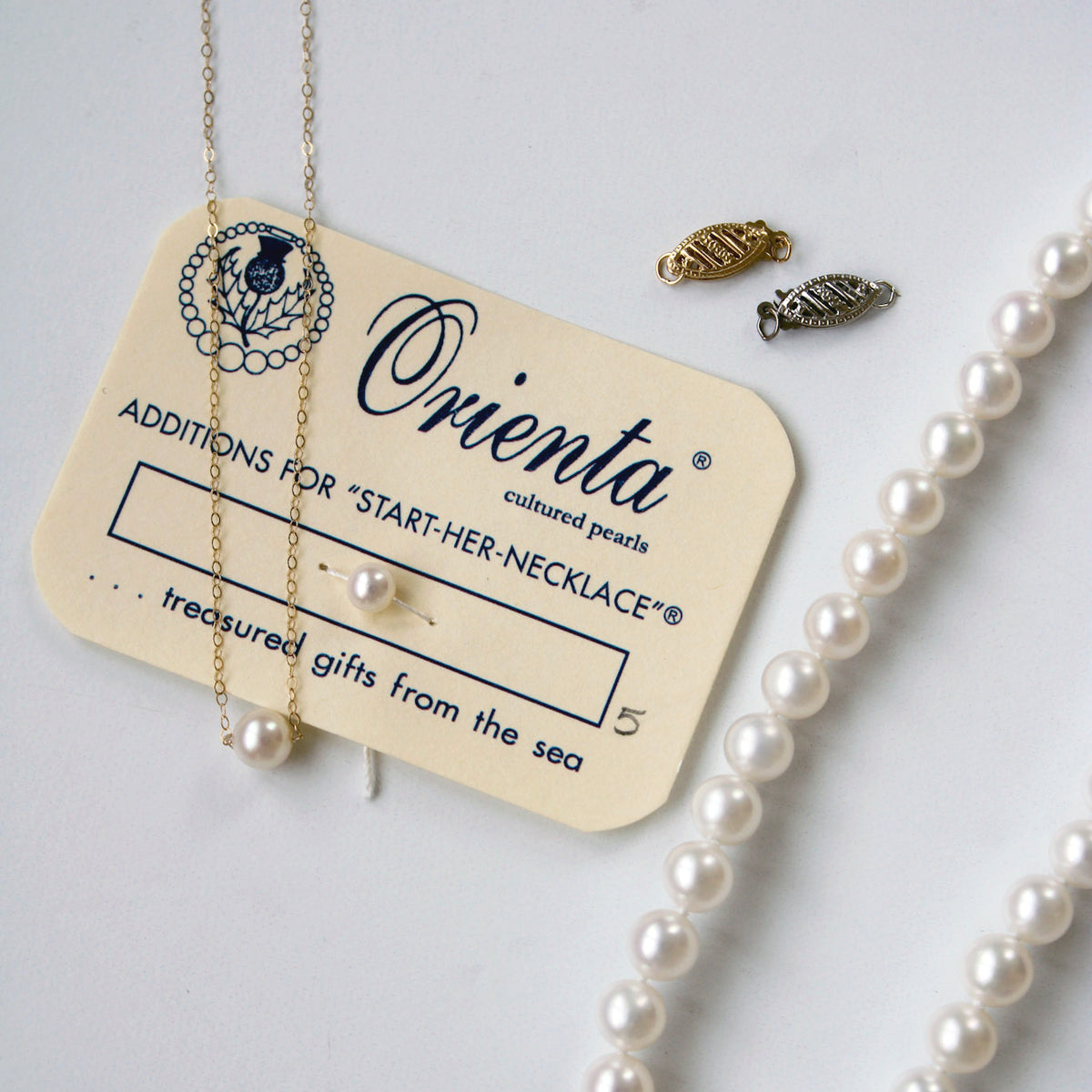 Single Pearl 14K Gold Start-Her-Necklace card addition and traditional clasp options