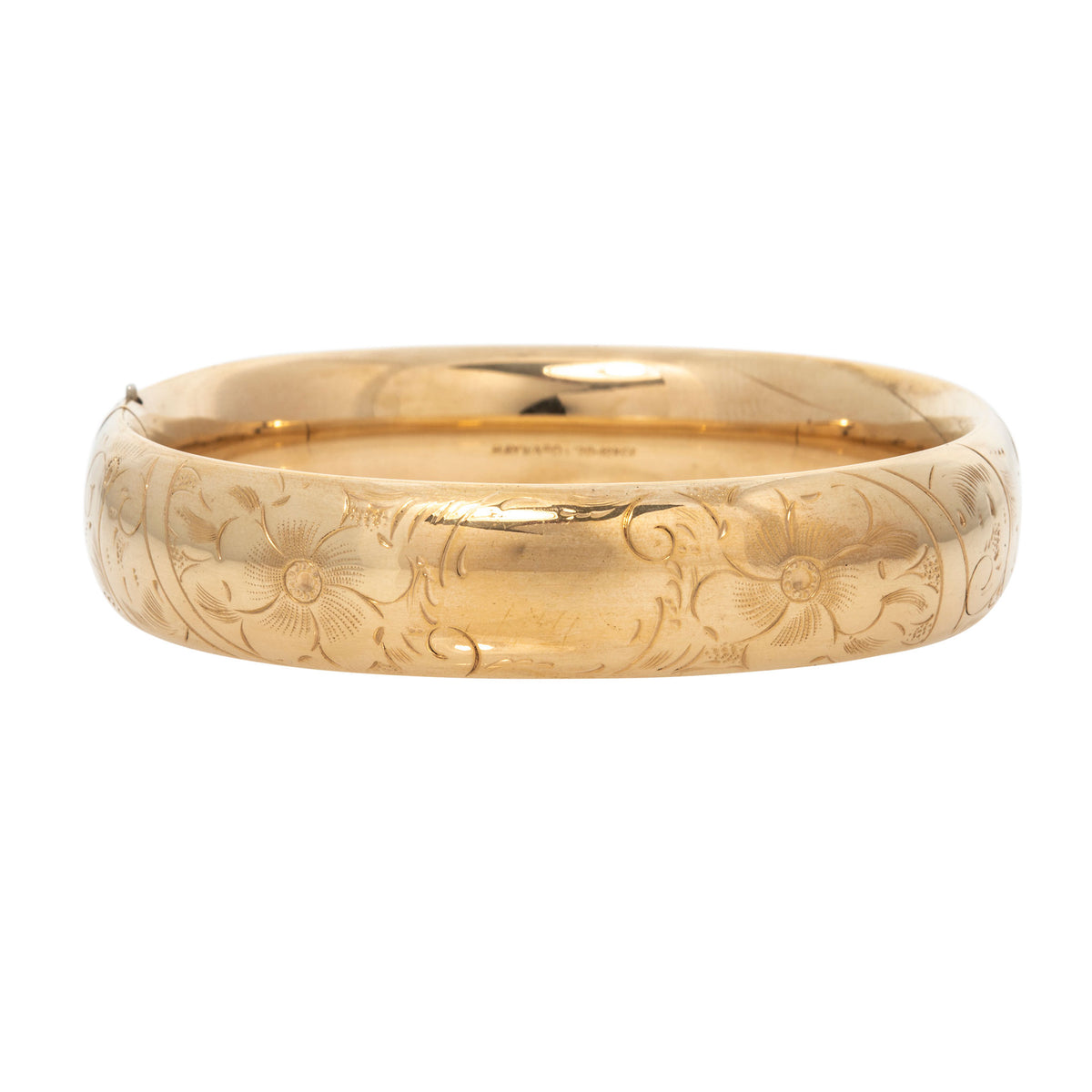 Vintage Engraved Floral Pattern Gold-Filled Bangle on a white background.