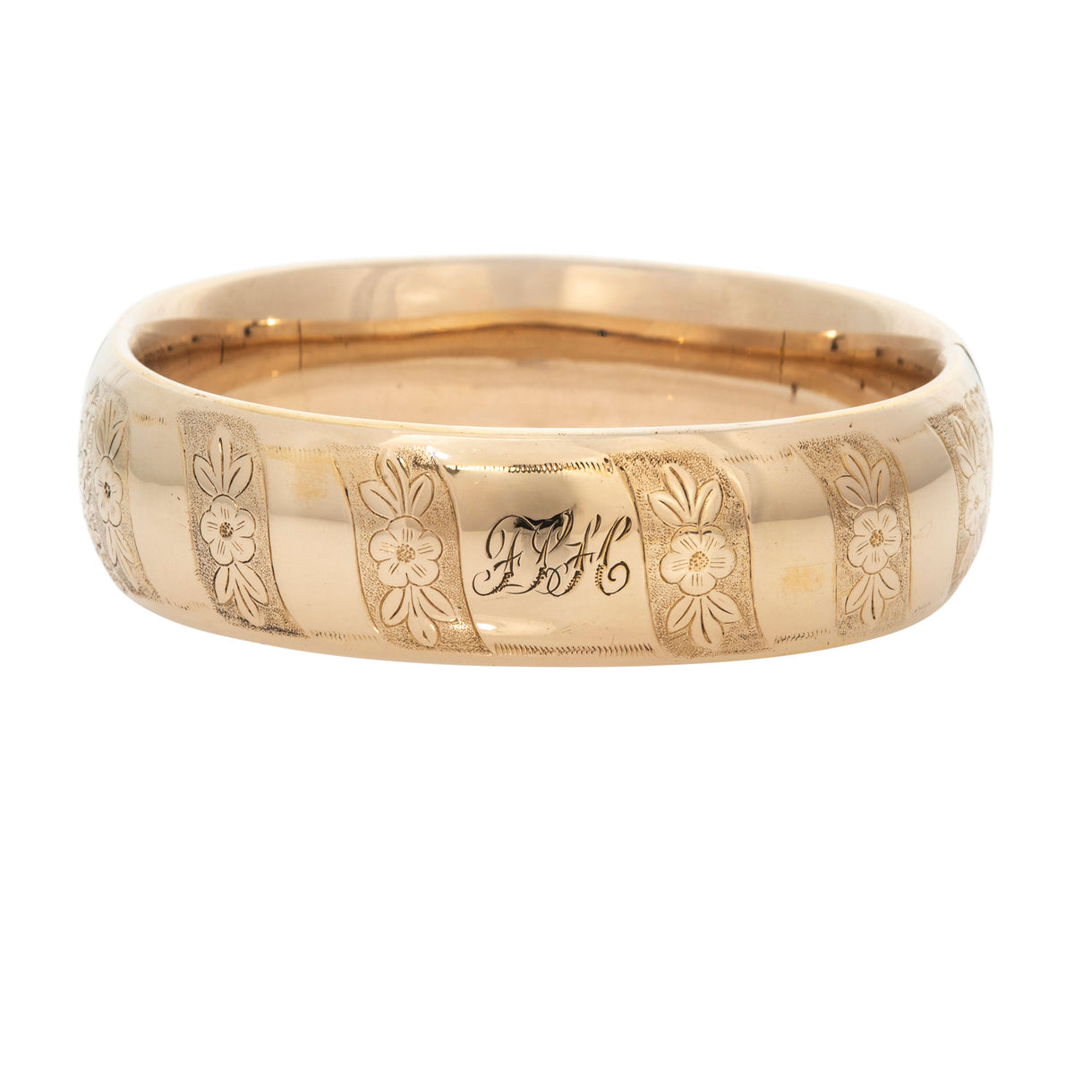 Vintage Engraved Floral Pattern Wide Gold-Filled Bangle on a white background.