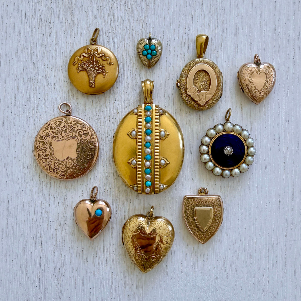 Collection of various antique lockets and pendants