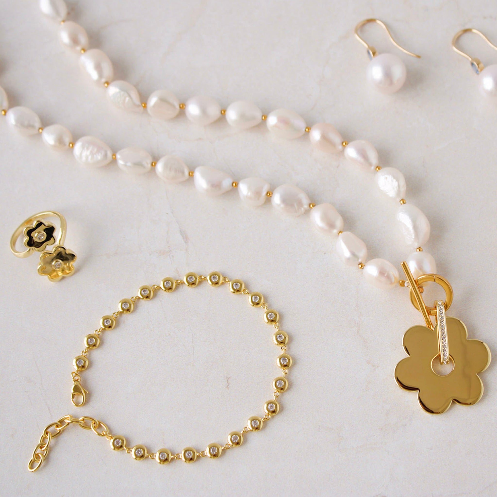 Goldbug Collection Double Daisy Ring, Goldbug Collection Bezel Bracelet, Goldbug Collection White Topaz Spinning Daisy Charm, Goldbug Collection Freshwater Pearl Toggle Charm Necklace