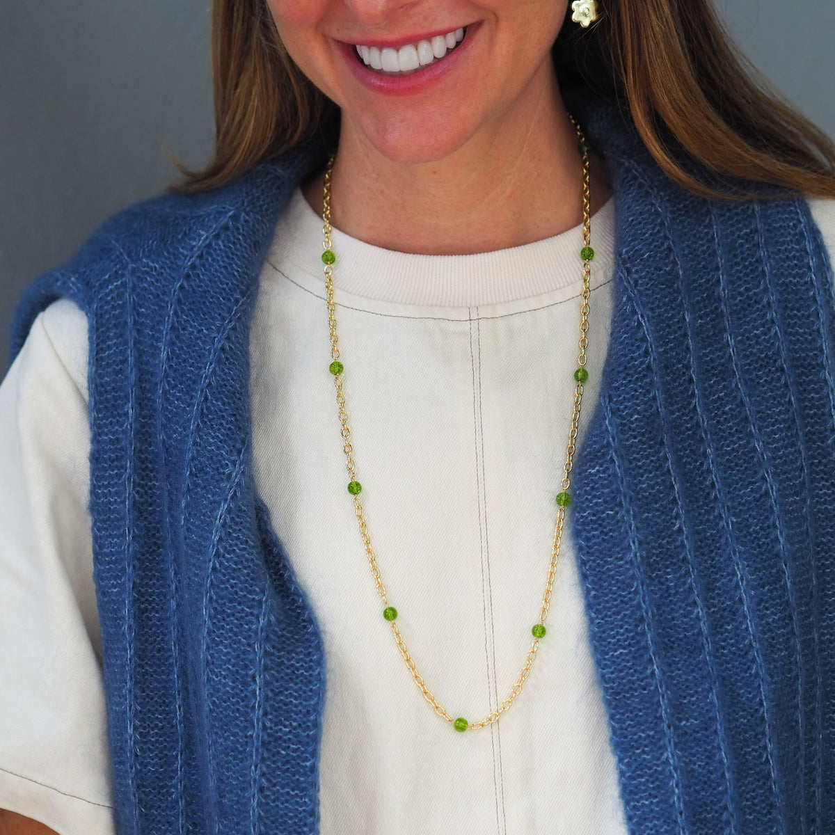 Model wearing the Goldbug Collection Peridot Bead Thick Cable Chain Necklace 30"