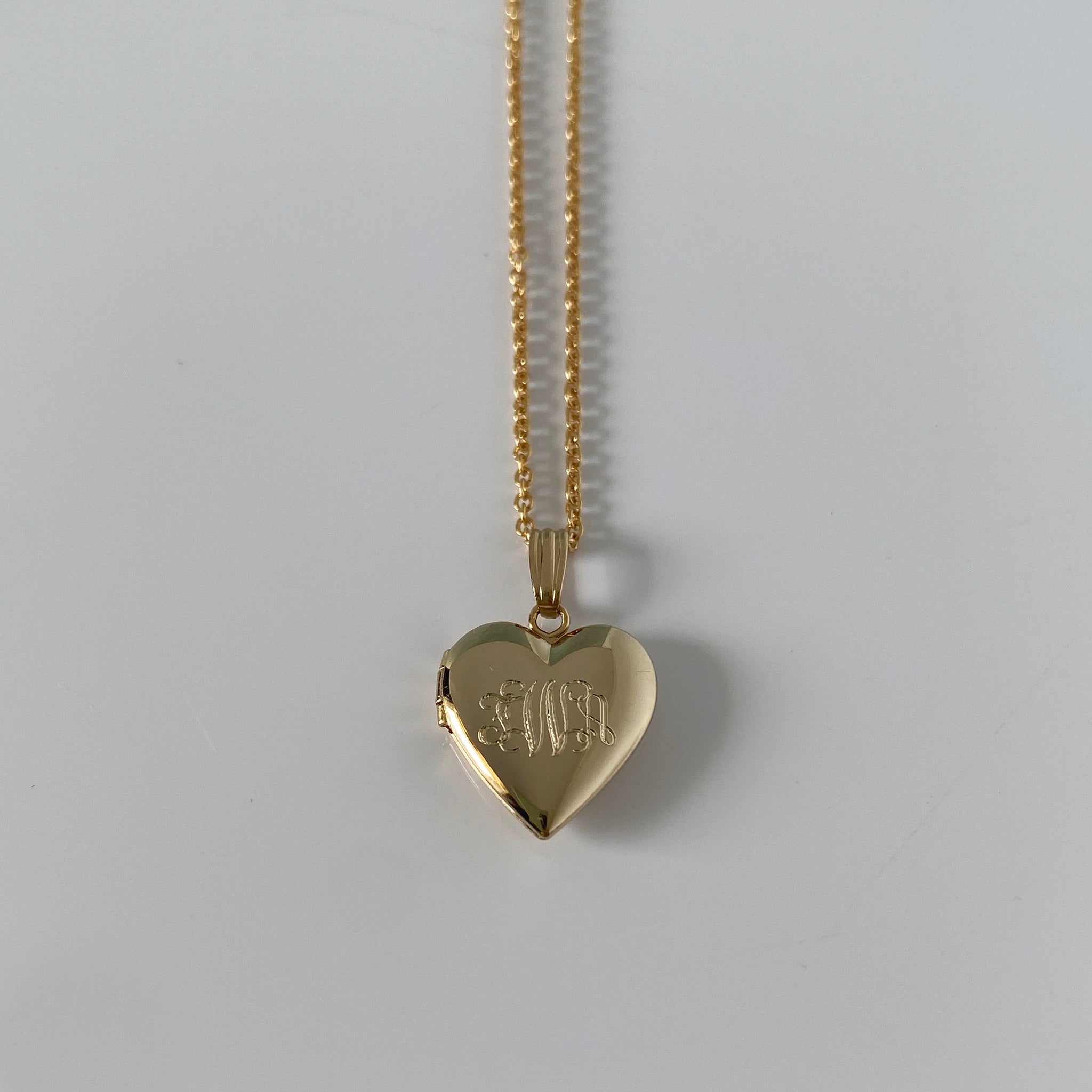 Child 14K Gold Filled Heart Locket Necklace with machine engraved interlocking script monogram